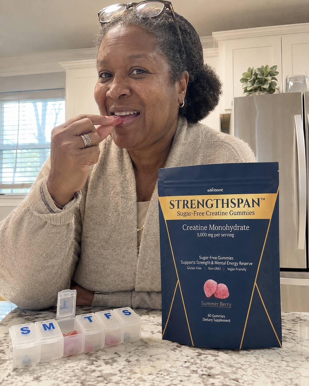 Susan, 55, filling her weekly pill organizer with Strengthspan gummies
